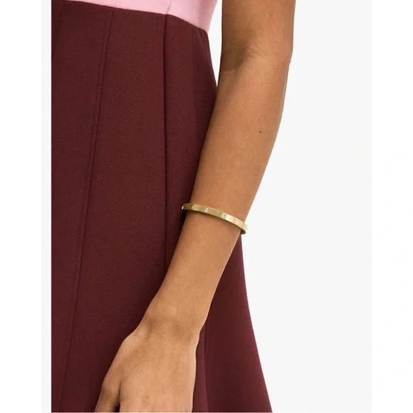KATE SPADE • Infinite Spade Gold Hinge Bangle Bracelet - Picture 2 of 5